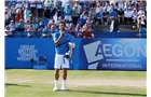 EASTBOURNE, ENGLAND - JUNE 21:  Feliciano Lopez of Spain celebrates with the trophy after beating Richard Gasquet of France during their Men's Singles Finals match on day eight of the Aegon International at Devonshire Park on June 21, 2014 in Eastbourne, England. (Photo by Jan Kruger/Getty Images)